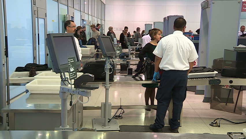 Toronto, Ontario, Canada June 2015 Airport security screening for weapons at Toronto Pearson international airport | Shutterstock HD Video #16741615