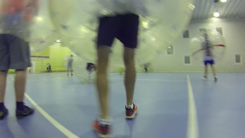 MOSCOW - SEP 23, 2015: (FPV) People play new game bumperball, New sport bumperball appeared in 2011 in Norway
