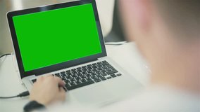 laptop with green screen