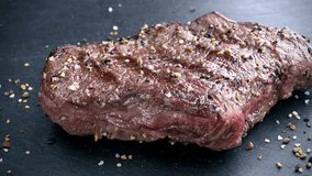 Piece of grilled Beef (seamless loopable high detailed 4K UHD footage)