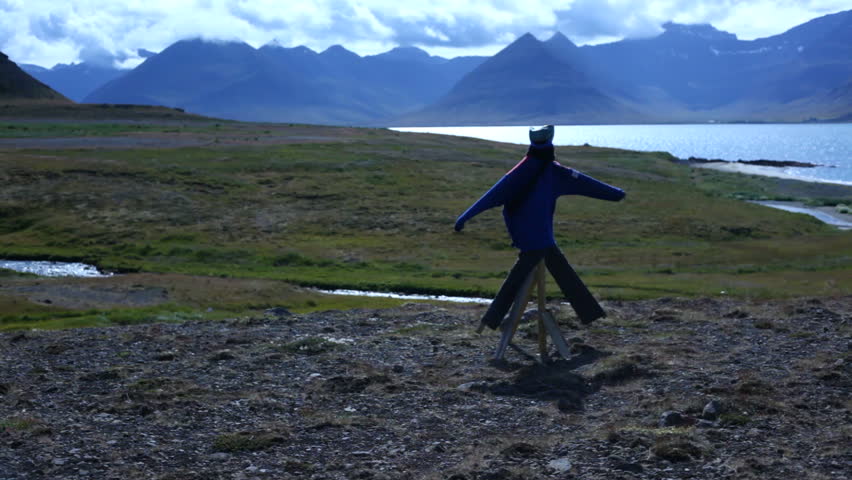 Scarecrow on a farm in the mountains of Iceland