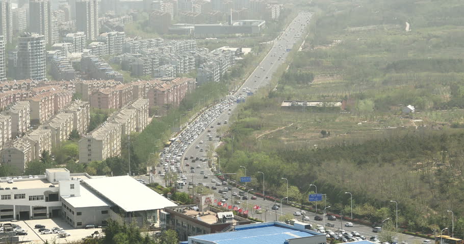 4k timelapse china urban city busy traffic jams,highway street & business houses building,air pollution. gh2_11361_4k