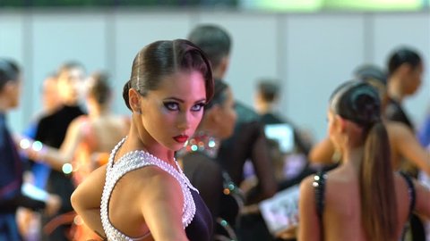 MOSCOW, RUSSIA - MAY 09, 2016: Beautiful girl with artistic makeup dancing in the ballroom. Close-up, slow motion. XIII world Dance Olympiad 2016.
