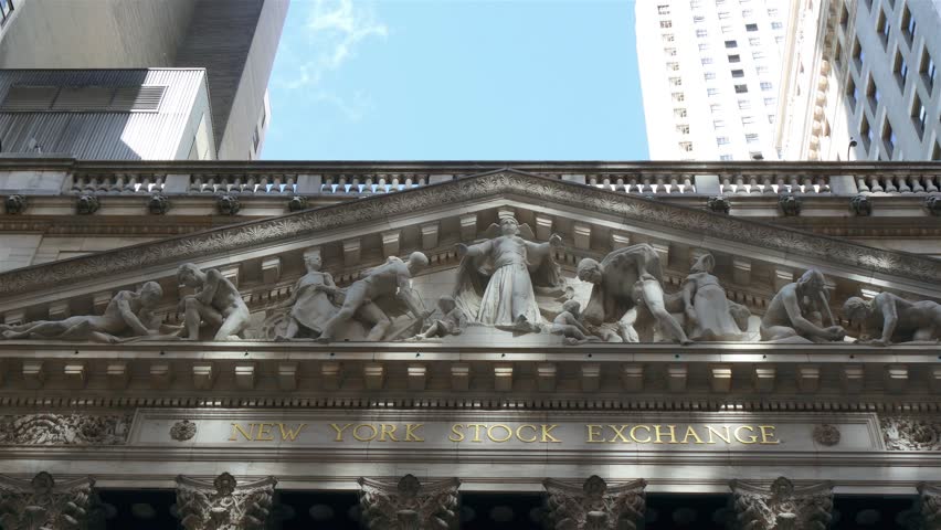 NEW YORK - SEPTEMBER 20:  A speedup video of New York Stock Exchange building on September 20, 2015 in New York. NYSE is an American stock exchange, the world
