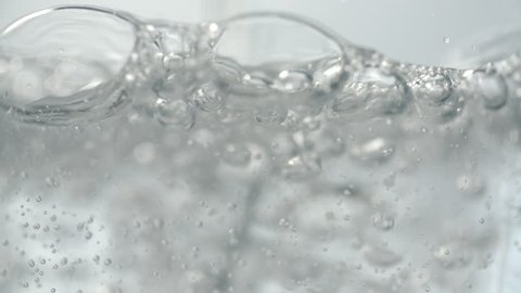 Soda Water 3
Pouring transparent soda water in a glass.
Slow motion stock footage.