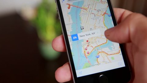 Close-Up Of Hands Using Google Maps In Smart Phone. Man Holds Phone In Hands And Uses Gps