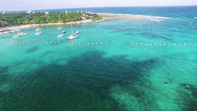 4K Aerial drone shot mexico toward above akumal island