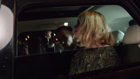 Celebrity couple arriving in limo, photographed by paparazzi, shot on R3D