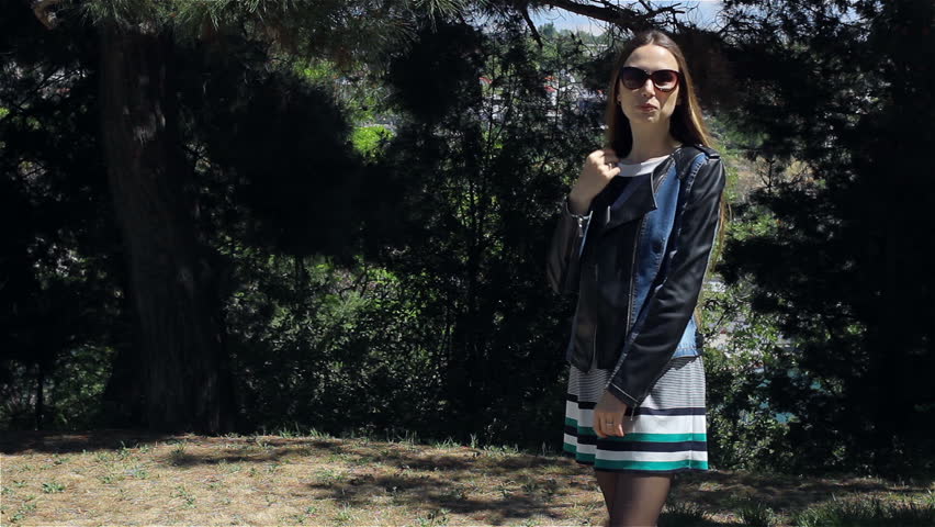 Young attractive girl with sunglasses