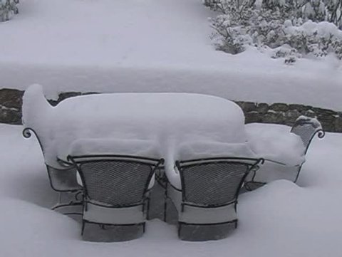 Table and Chairs in Snowfall