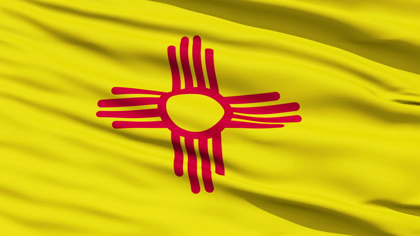 Waving Flag Of The US State Of New Mexico bearing the red sun symbol of the Zia