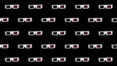 Many Anaglyph 3-D glasses isolated rotation on black background loop