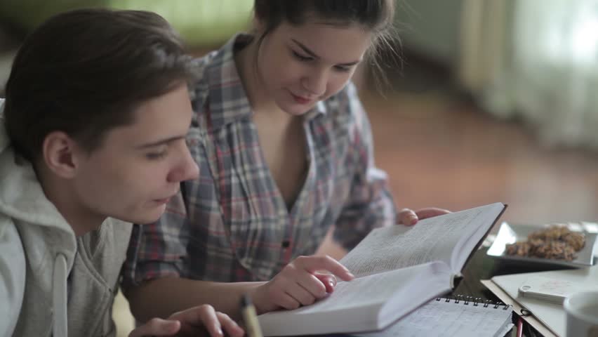Students carefully read the tutorial. | Shutterstock HD Video #16879333