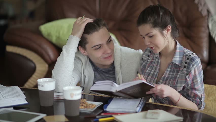 Female  student is explaining the task.