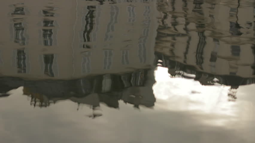 Paris, France - October 10, 2014: Building reflected on water