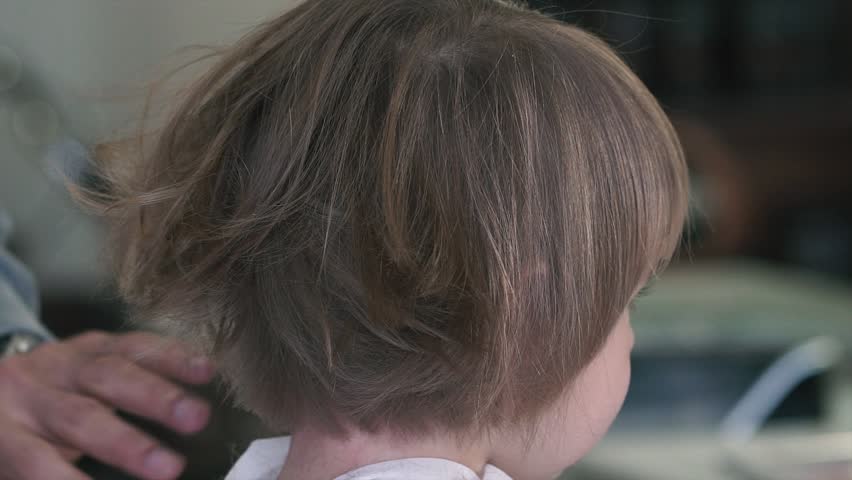 cutting girls hair with clippers