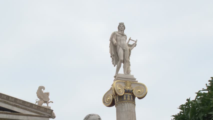 Tilt to the statue of Socrates from the column of Apollo beside the Academy of Athens
