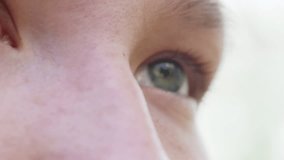 close up green eye teen girl outdoor slow motion shallow focus, 180fps prores footage