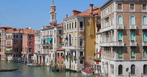 VENICE ITALY 10 JUL 2015: canal architecture. Grand channel gondolas boat. Venezia, Europe city travel by water. Old venetian, italian romantic landmarks. Famous cityscape houses, buildings. Tourism