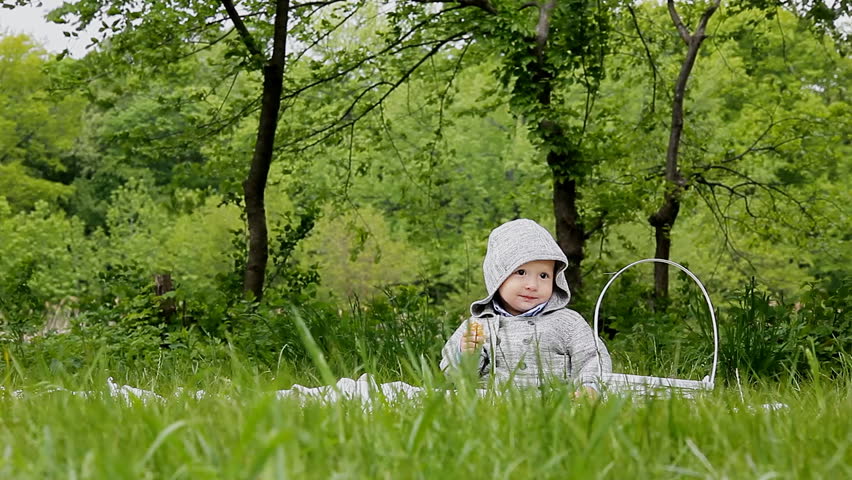 Dad with his son playing in the park