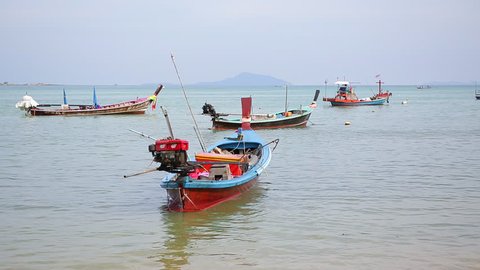 Fishing boats in the bay waiting for the departure
