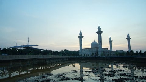 KUALA LUMPUR, 28 May 2016: Cloudy amazing sunrise at Bukit Jelutong Mosque . HD Timelapse.