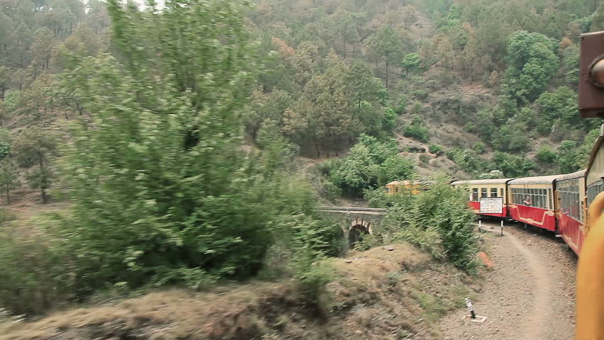 Historic train on the way to the Shimla mountain resort, UNESCO World Heritage Site, Himachal Pradesh, India.