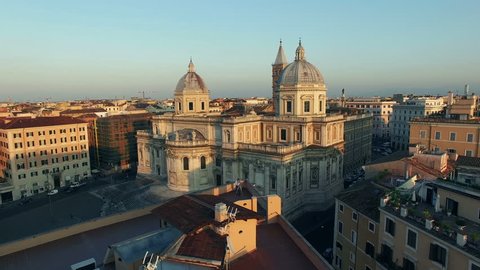 Rome, Italy, March 2016 - Aerial video of Basilica of Saint Mary Major,  the largest Catholic Marian church in Rome, located in Piazza del Esquilino.  The camera moves away quickly. N