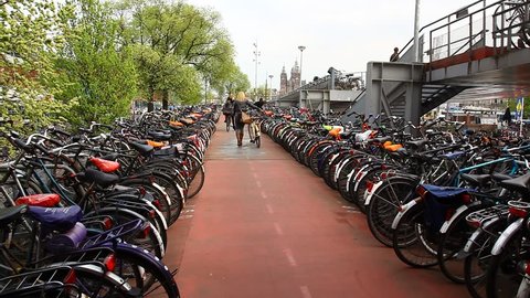  A parking lot is packed densely with bicycles near Centraal Station circa April 2011 in Amsterdam.