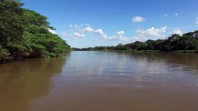 video with drone over river - Aerial dolly in and craning with drone over river Moji-Guacu in Sao Paulo / Brazil - Drone flying close to the water in the Mogi Guacu river