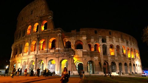 ROME, ITALY - APRIL 18: Tourists visit the famous Colosseum at night on April 18, 2015 in Rome, Italy.
