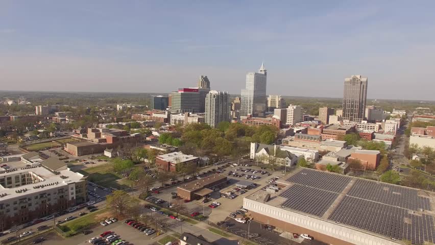 Aerial footage moving toward Moore Square and downtown Raleigh.