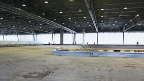 Panorama of spacious empty floor of building with included illumination - Powered by Shutterstock - Get 15% off with code: PIKWIZARD15