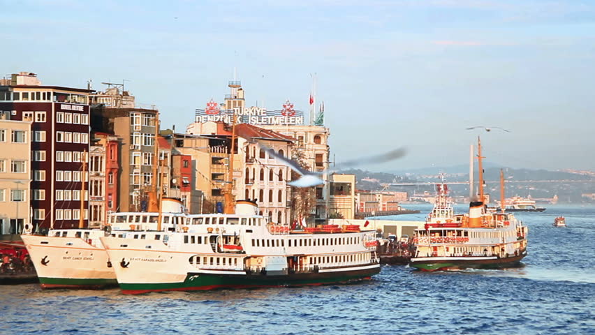 ISTANBUL - FEBRUARY 11: Karakoy Port with berthed ferries and gulls on February