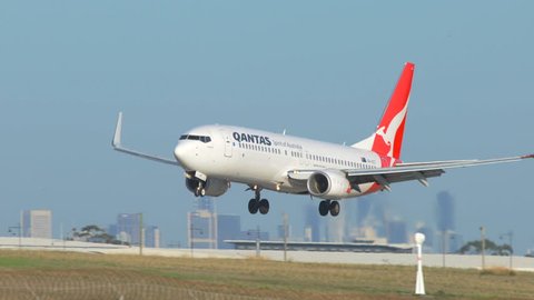 Melbourne, Australia - May 6, 2016: 4k video of Qantas passenger airplane landing at Melbourne Airport
