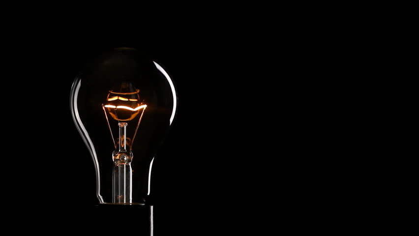 light bulb over black background Stock Footage Video (100% Royalty-free ...