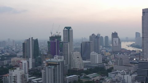 BANGKOK, THAILAND - JANUARY 2016: sunset twilight roof top city panorama 4k time lapse circa january 2016 bangkok, thailand.