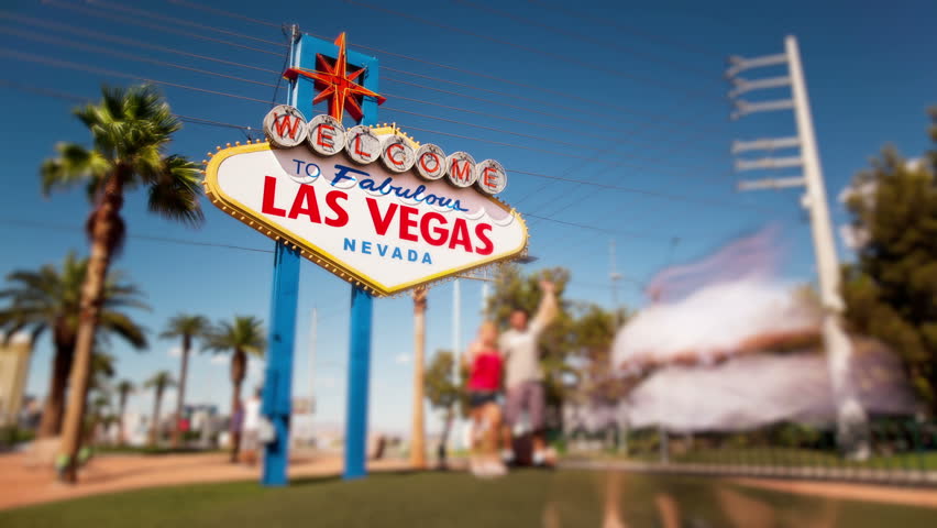 Timelapse of people taking photographs in front of the Welcome to Las Vegas sign