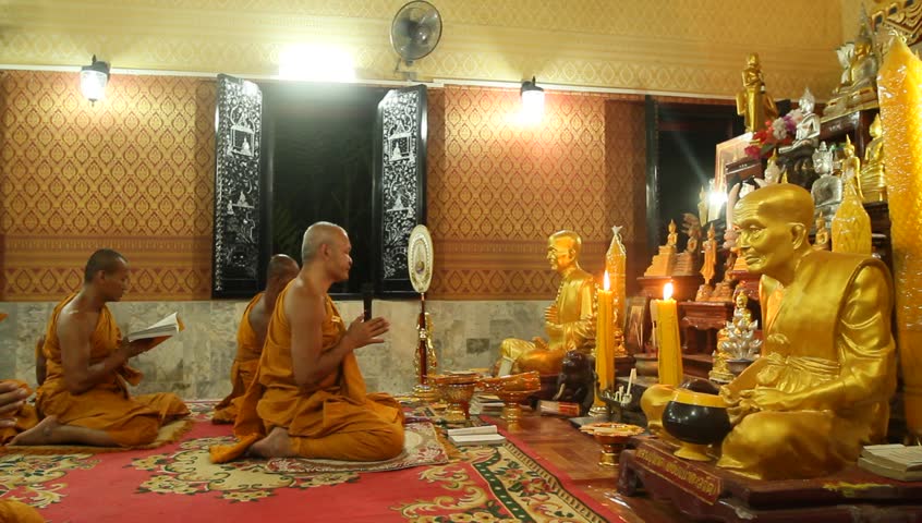 KOH CHANG, THAILAND - DECEMBER 5: Recitation of mantras by monks in a Buddhist