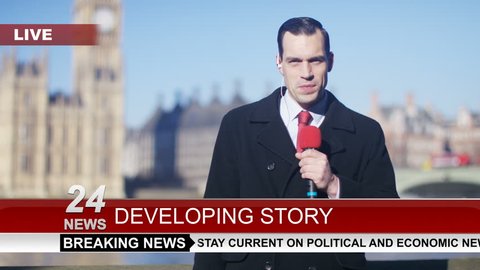 4K News reporter doing live piece to camera outdoors in the city of London UK - April, 2016