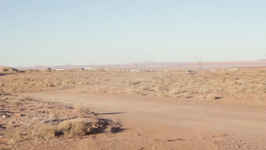 Red Car Drive Through Desert