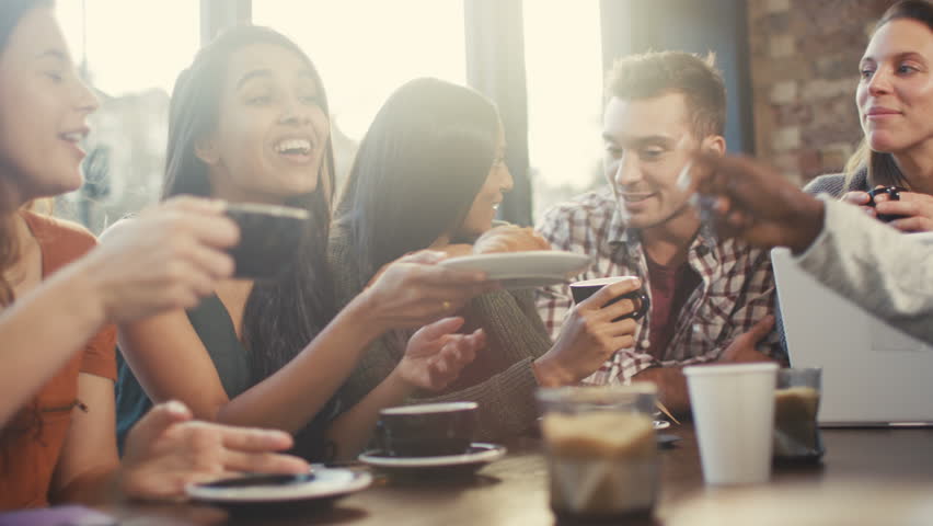 4K Happy group of friends chatting & having drinks in city coffee shop UK - April, 2016 | Shutterstock HD Video #16995163