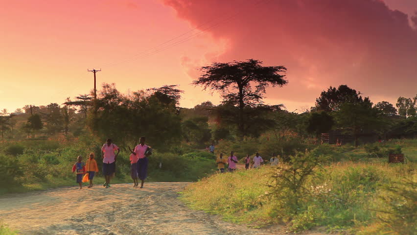 KENYA, AFRICA - CIRCA AUGUST 2010: Huge groups of kids walking to school as the