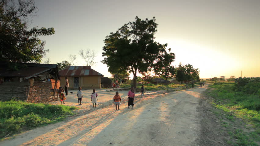 KENYA, AFRICA - CIRCA AUGUST 2010: Shot of children playing in the dirt roads in