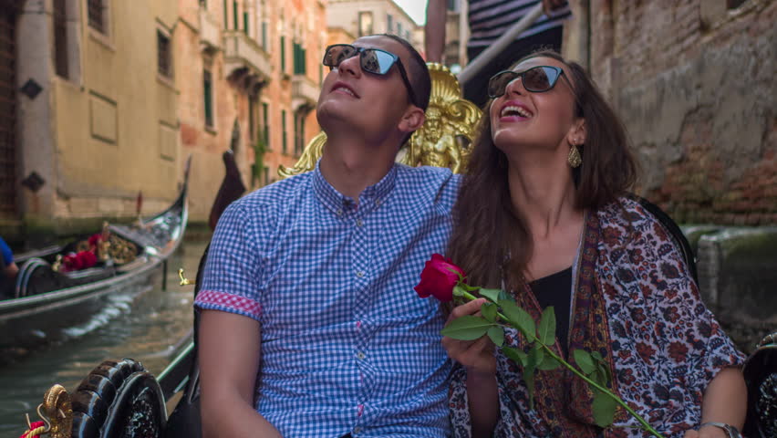 Happy Couple Looking Up Traveling Gondola Grand Canal Woman Holding Rose Man Tourist Honeymoon Famous Transport Nautical Affection Vacation