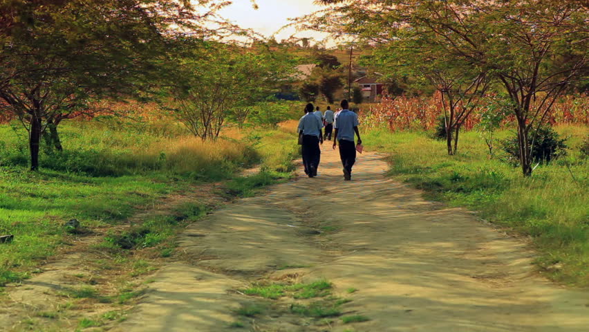 School boys walking home from school in Kenya, Africa