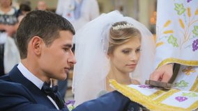 Bride taking wedding vows in church