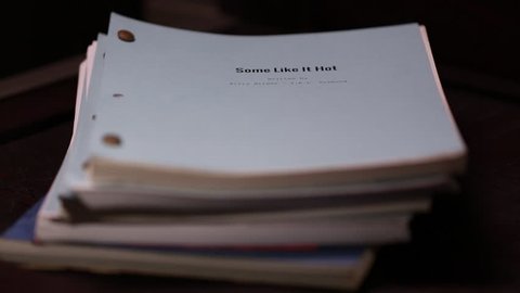 Los Angeles, California - USA - October, 2013: Stack of scripts some like it hot on top rack focus title.