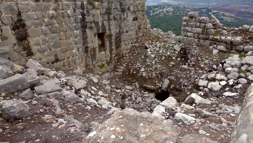 Dolly slider move right to left of the absolute ruin of part of Nimrod Fortress in the Golan Heights region of Israel.  