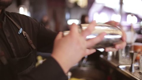 Bartender make cocktail in a bar